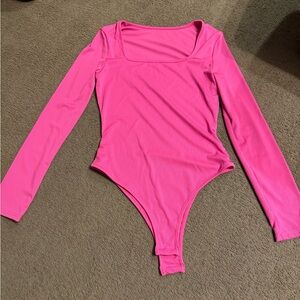 Three body suits. Never worn. $18 for all